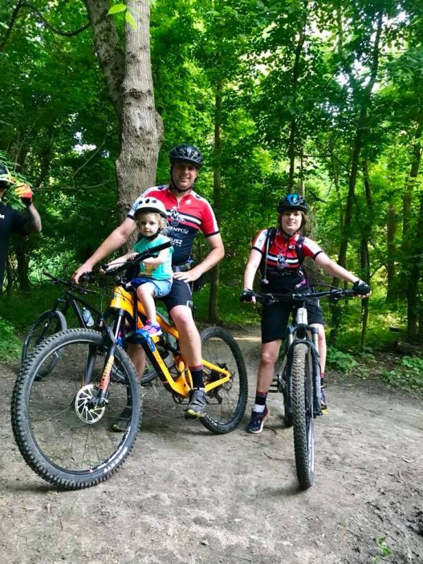 Bridge ride little kid on front of bike